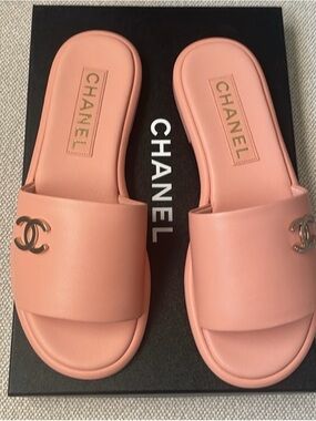 CHANEL Pink Slide Sandals with Metal CC Emblem